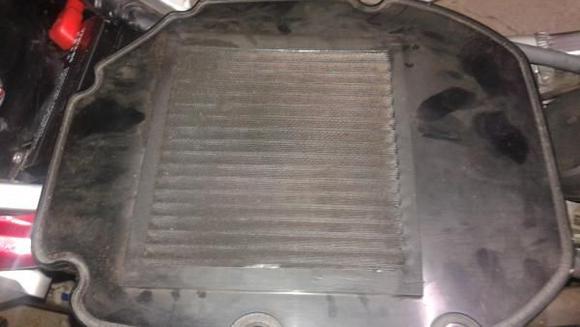 Wtf is that an air filter or used ape Tp!? dirty as a mofo no wonder shes sluggin.