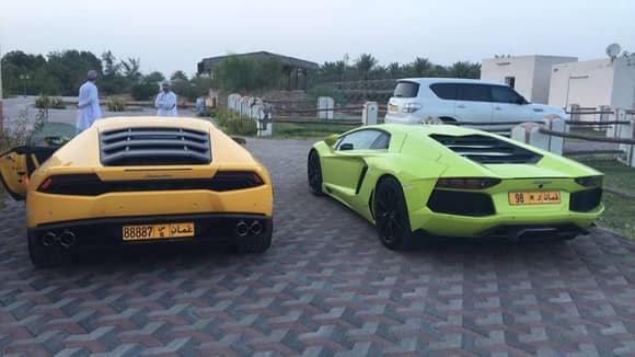 Ahmed Al-Harthy's Neon Green Lamborghini Aventador LP 700-4 along with other cars such as the Yellow Lamborghini Huracan LP 610-4 and Dodge Viper ACR. Location: Muscat, Oman.