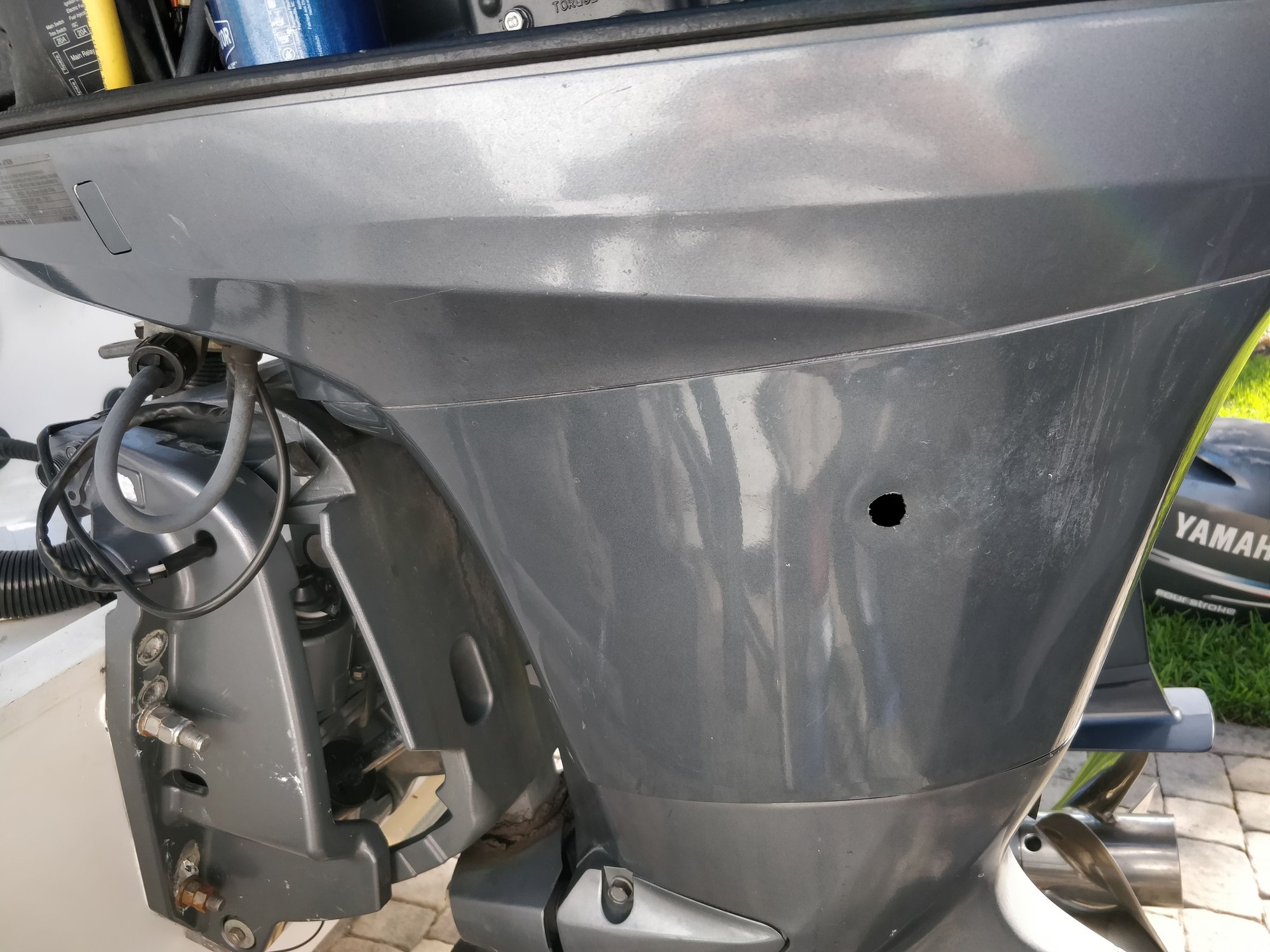 2005 Yamaha F150 hole in upper exhaust burned right through apron on