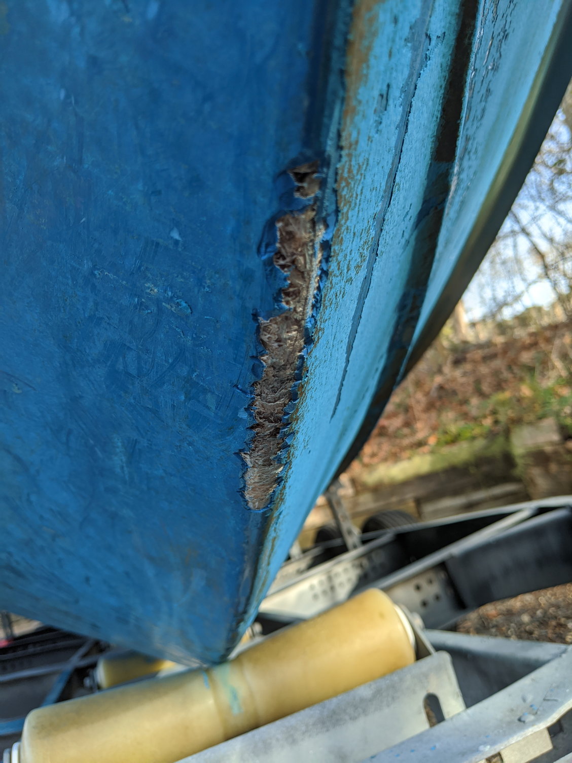 MARINE TEX: repairing damage to fiberglass hull boat bottom