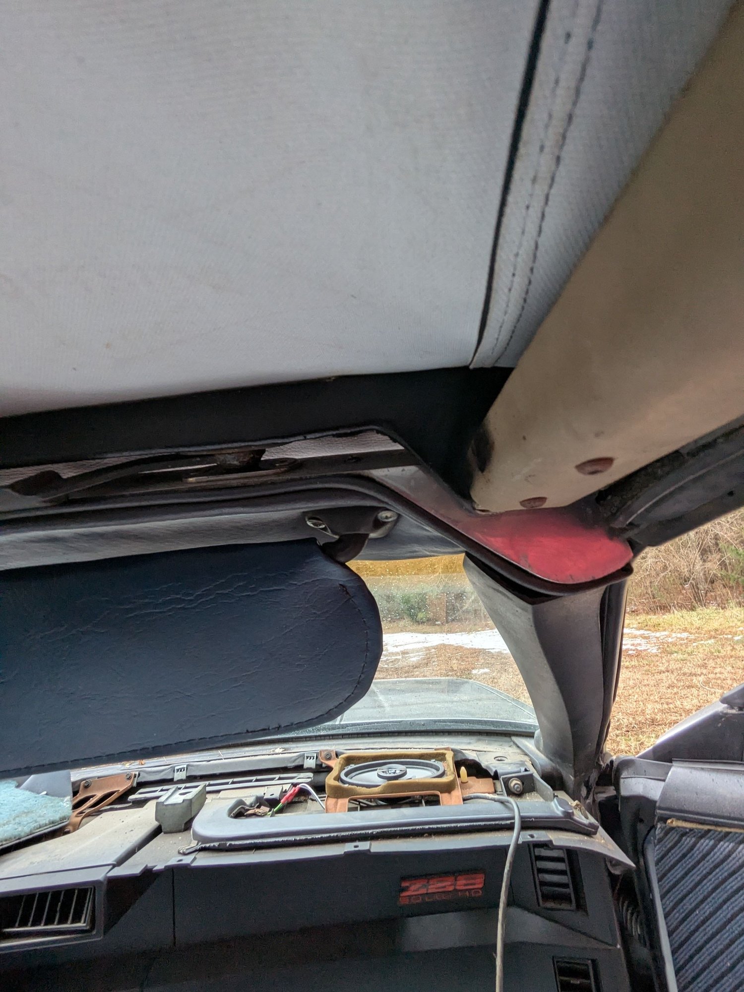 Inside view of top meeting windshield, showing the gap