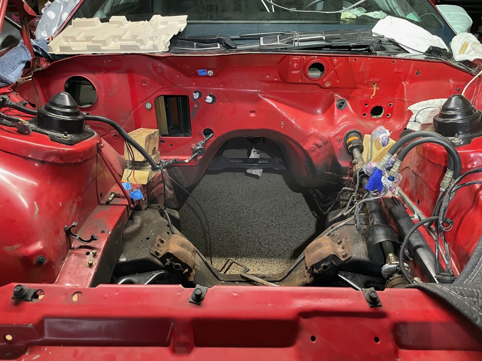 Disregard the wood blocks on the frame rails.  I'll remove the fuel lines, brake lines and steering shaft.