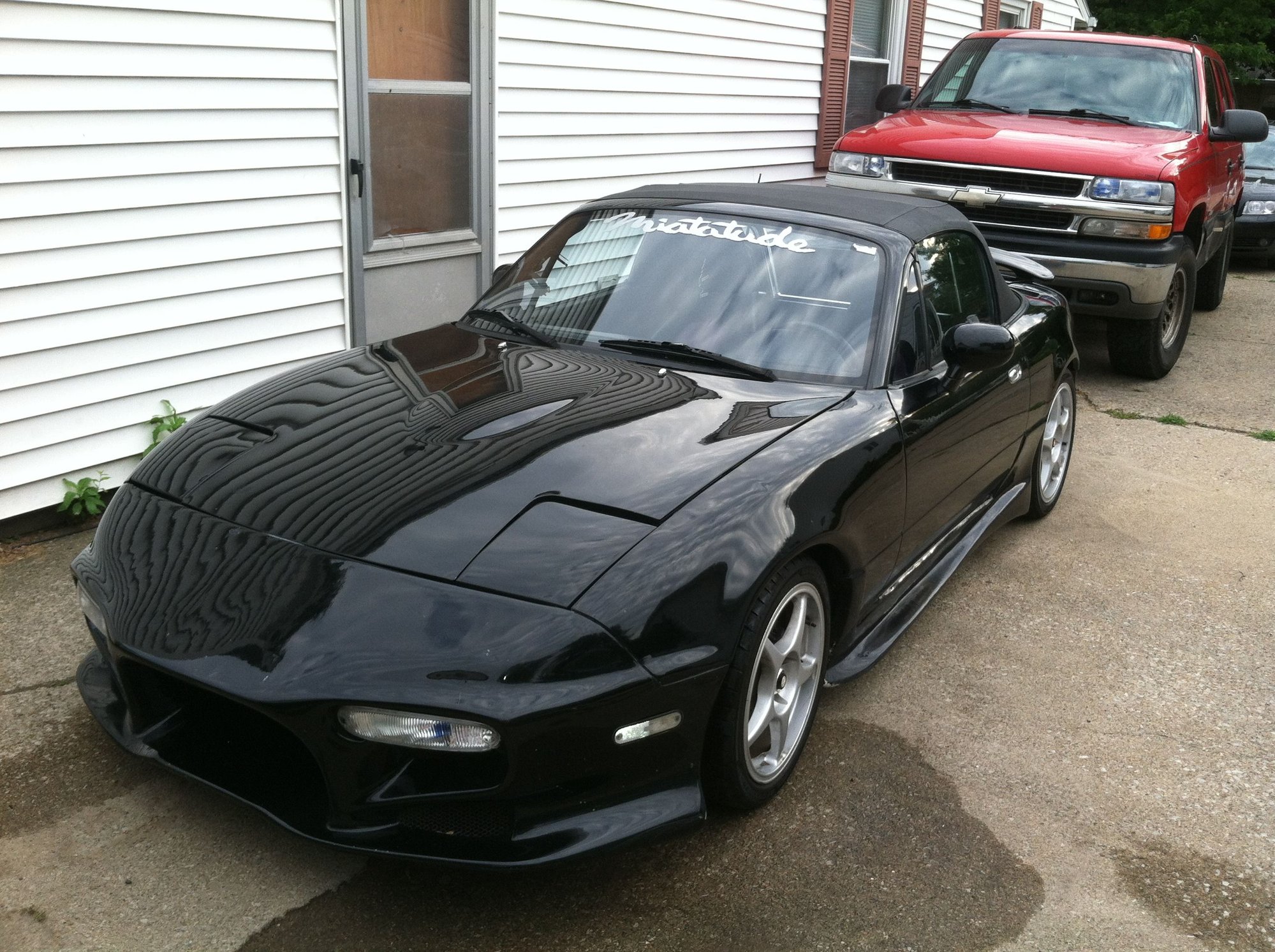 The wife�s first car. 94 Miata was modified early 00s so it has all the tuner goodies including the veilside body kit and of course NOS! Haha