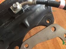 Caliper prior to machining. I just used a sharpie and traced the outline of the bracket onto the caliper, then milled to the line I drew - did it at lunchtime!