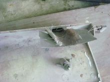 Rebuilding the missing part of the lower mount tab.