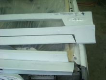 I'll put 2 more coats of the white epoxy on after repairs and then put them back on the car.