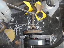 Pulling the pulley off the pump.