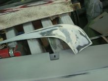 Bondo on spoiler corner sanded out.