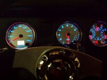 night time shot of gauges with leds