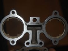 Good enough for me.  Could have scrubbed it until all traces of pitting were gone, but the gasket will easily seal this piece.