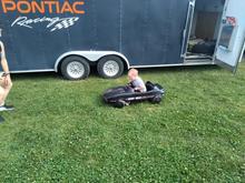 Another young man at the show enjoyed the pedal car