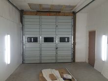 The main door was there. Designed the ceiling filter bank to filter incoming air into the room and create a down-draft type booth. Its not state of the art but for around $1000 and some elbow grease I think I made a decent "at home" booth.