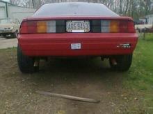 previous owner put on a chain border to rear license plate, flip down rubs paint, hasnt rubbed through but its getting close