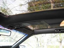 I installed a Berlinetta overhead console, which gained me a map light and a handy mounting for my electric fan switches.  The left controls the main puller fan (also from the 1990 RS), the right controls dual 14 inch pusher fans from a 1993 Lexus LS400.  Staying cool is NOT an issue.