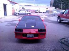 Stock hood wouldnt fit with intake and nitrous plate. Had to go with 4" cowl. I think it looks cool.
