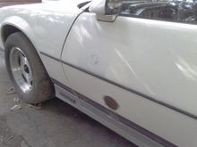 sanded rust spot on the driver side door