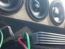 3 menace 1000 watt subwoofer powered by 1 3000 watt mono block menace amp. custom box that goes from behind the back seats, back window, and then down into the hatch area. it slams