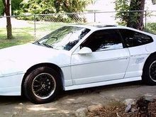1985 Fiero GT. Was originally a notchback, then I converted the rear end to a fastback. The best car Ive ever owned, the all around driving performance cant be beat. This things turns heads in white primer, its such a cool car and you dont see them around much. Only made for 4 years. Fire is the first thing people mention with Fieros, but in actuality more Fords, Chevys, and Toyotas caught on fire than Fieros.