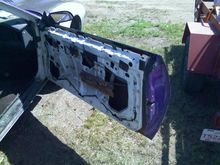 passenger door with inner panel removed to get at the broken window to replace it.