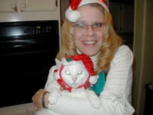 My good looking wife Diane at Christmas 2008 with her cat Surgar.