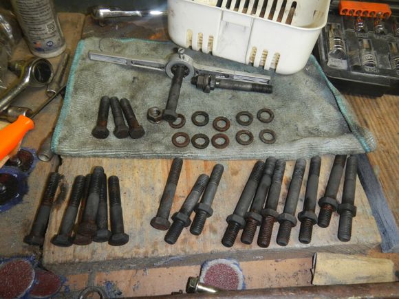 Exhaust bolts after soaking overnight. I have extras so need to figure out which ones go where.