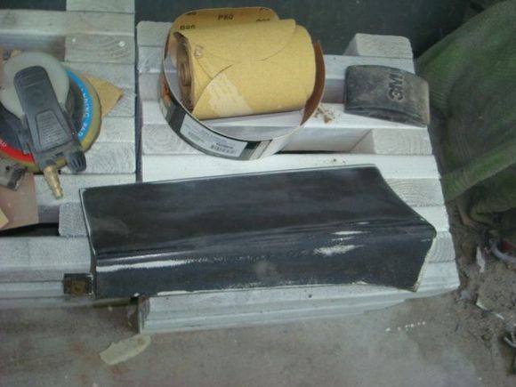 Passenger rear lower ground effect off the parts car sanded and ready for epoxy.
