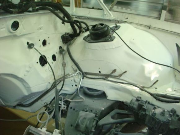 Wiring harness bolted back to the firewall.


.