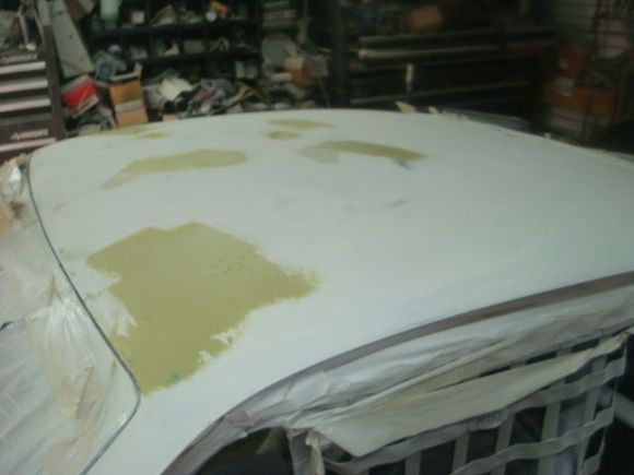 Driver side after more hammer and dolly work on the front corner and a little more bondo.