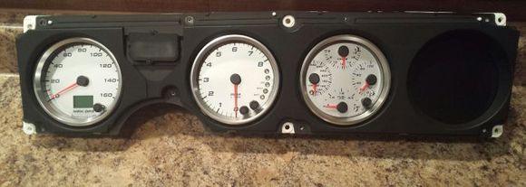 stock outer housing piece cut around gauges for flush finish