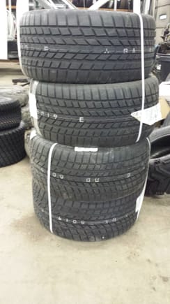 Sacrificial tires for the Gods of tire smoke.
Just cheap tires that look close to originals