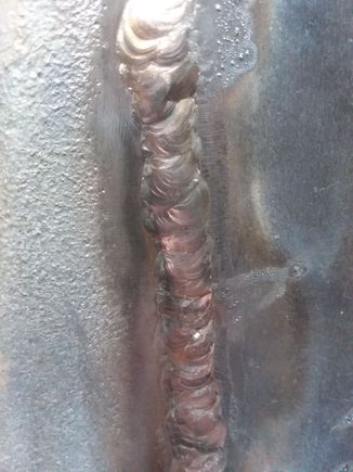 Its ok, getting better. Surprisingly this cast welds clean, nice puddle, wet wo crap floating in it. 
Its just hard to weld something thats 500 deg. U cant touch it. And the heat coming of it is like a grill. If i do this again, i will make a separate platform for my tig hand to run across. This was welded around 200 amps. 