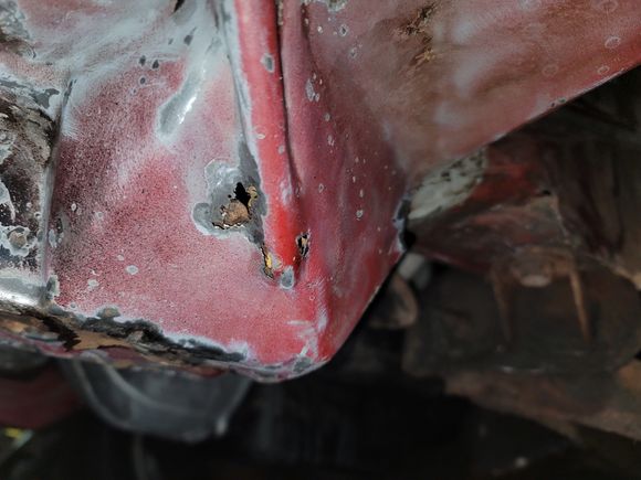 frame to rocker panel connector had some holes in it from debris getting trapped in it