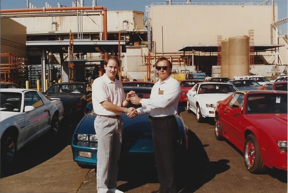 Paul Crain from Public Relations handing me the keys. He was so nervous every day worried the car would get some poor quality job. He wouldn't let me show up at the plant until he knew the car was perfect from wherever it stopped the when production stopped night before