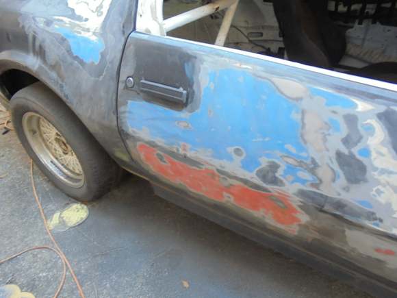 Sanding through the black to reveal the original paint as.raced