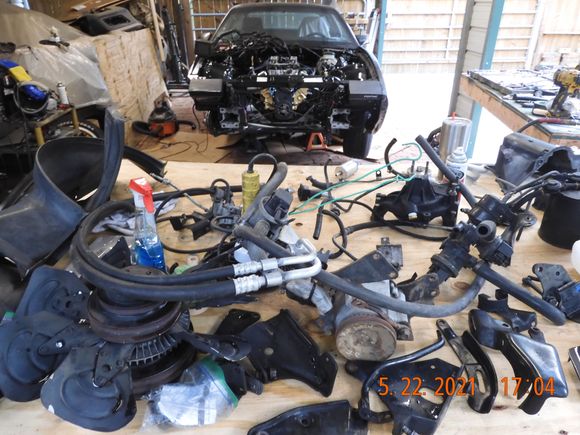 Pressure washed all remaining grungy brackets, shrouds and hoses for re-assy.