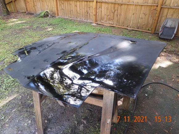 Wet sanded the hood to eliminate orange peel and bug tracks, with 800 to 2000 grit.  Buffing to bring back the shine, lower right.  Looking nice!