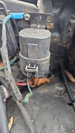Where the brown wire that was cut and tied into to main relay leads. 