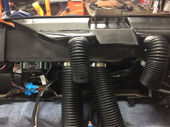 I hacked up the plenum and added fittings to attach the flex ducts. The GEN V system has adapters for the dash vents and uses new defrost ducts which preform much better.