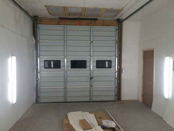 The main door was there. Designed the ceiling filter bank to filter incoming air into the room and create a down-draft type booth. Its not state of the art but for around $1000 and some elbow grease I think I made a decent "at home" booth.