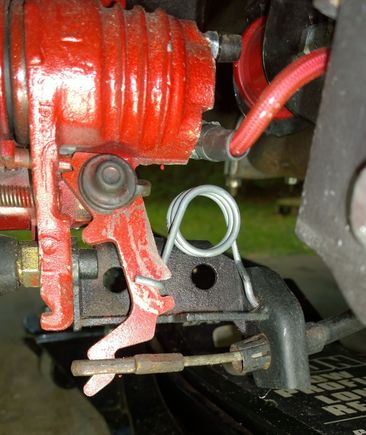 In a way, after I cut off the little hook and reshaped the wire to fit though the hole in the lever bracket, this setup looks more like a factory installation.