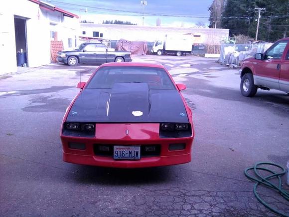 Stock hood wouldnt fit with intake and nitrous plate. Had to go with 4" cowl. I think it looks cool.