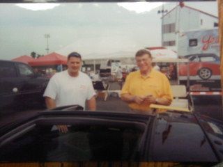 Jim Wangers signing my car during a road tip