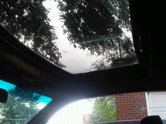 sun visor/slide cover OPEN WITH GLASS CLOSSED. for moon roof