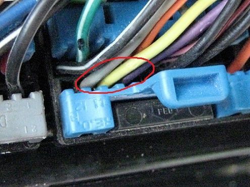 Here is the VSS and Speedometer wires circled in red. From left to right, B11 "GREY" speedometer, B10 "YELLOW" VSS Input  , B9 "PURPLE" VSS ground.