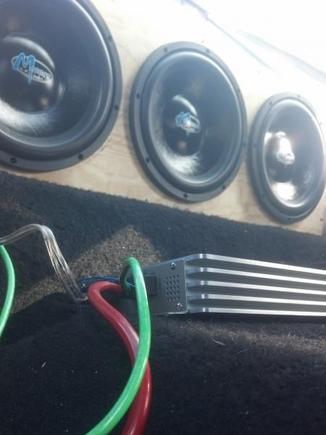 3 menace 1000 watt subwoofer powered by 1 3000 watt mono block menace amp. custom box that goes from behind the back seats, back window, and then down into the hatch area. it slams