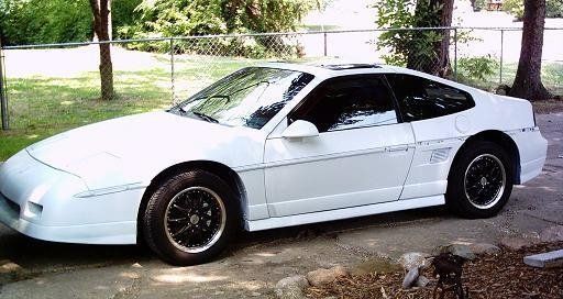 1985 Fiero GT. Was originally a notchback, then I converted the rear end to a fastback. The best car Ive ever owned, the all around driving performance cant be beat. This things turns heads in white primer, its such a cool car and you dont see them around much. Only made for 4 years. Fire is the first thing people mention with Fieros, but in actuality more Fords, Chevys, and Toyotas caught on fire than Fieros.
