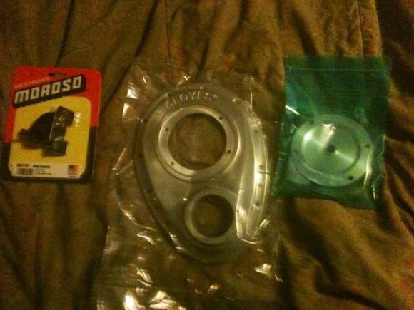 Two piece timing cover with billet aluminum Moroso timing pointer anodized black