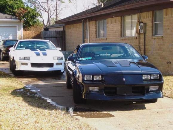 mah brothers black iroc and mah camaro and sisters 97 camaro in back !