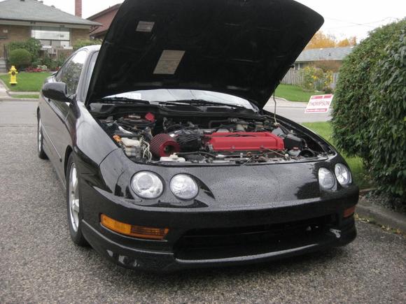 Freshly painted 98 front end with ITR lip. Red valve cover that adds 15whp:D