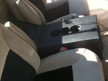 New bucket seats with custom console/speaker box housing 2-8" Rockford Fosgate subs that I built.  Replaced carpet, head lining, and pedals.